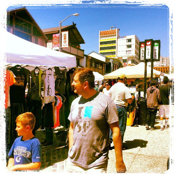 Father and Son Perusing Vendors