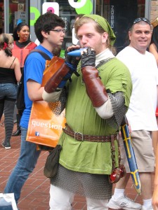 Link playing the Ocarina of Time in the Gaslamp.